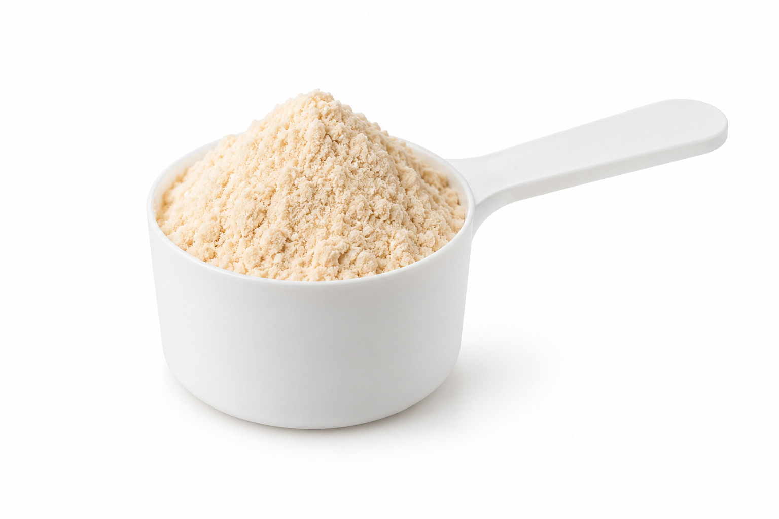 Measuring scoop of supplement powder on a white background